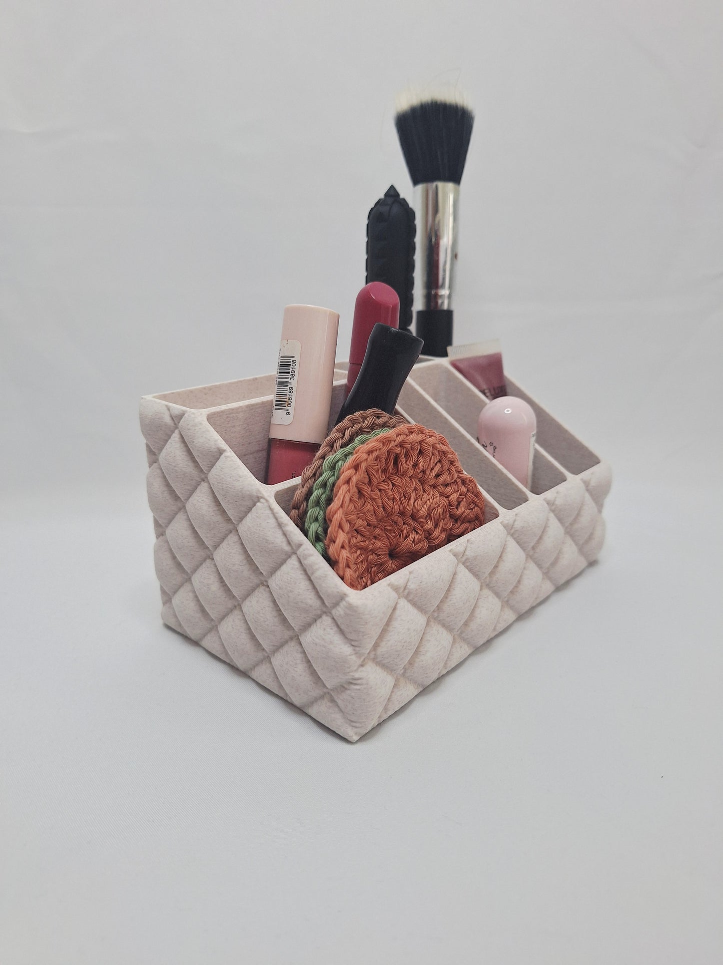 Make up holder that looks like it is inflated