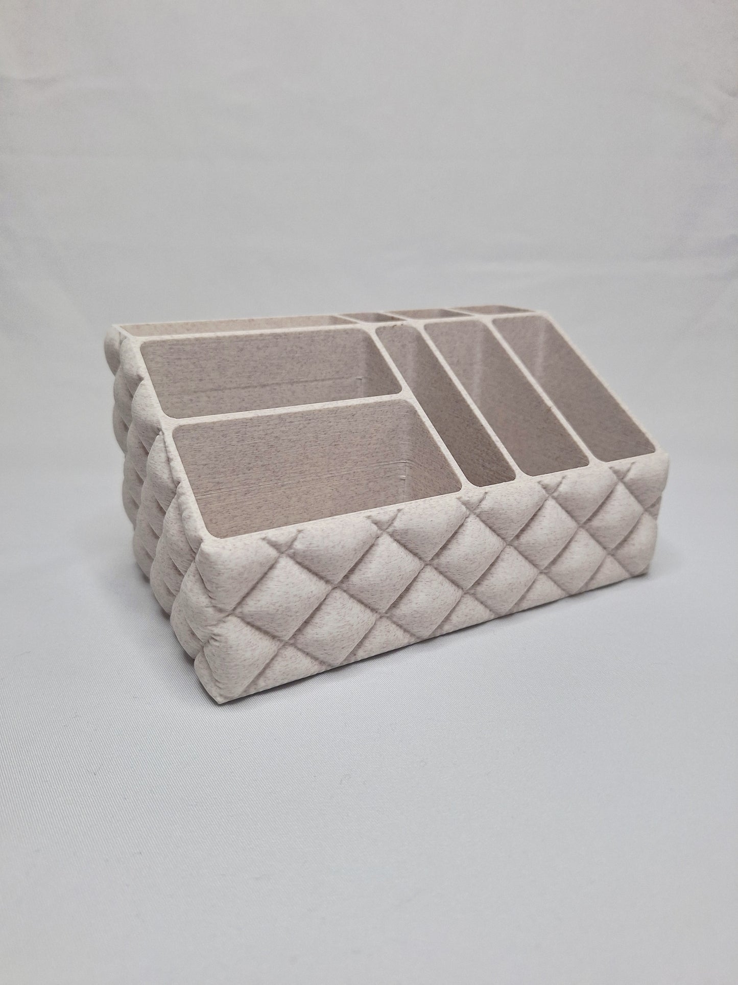 Make up holder that looks like it is inflated