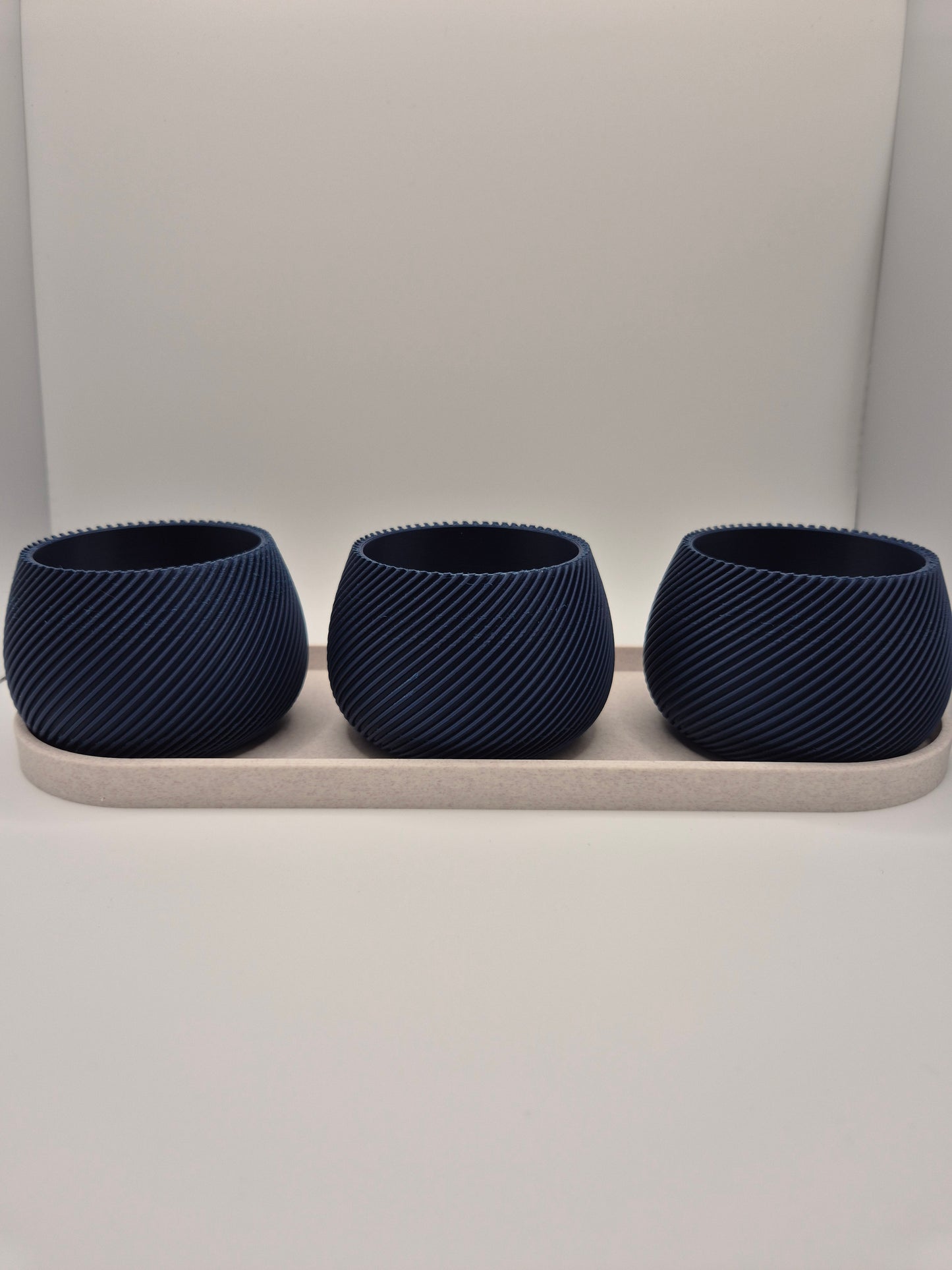 Elegant 3D printed plant pot and tea light holder set. White marble lattice design with plum insert. Perfect modern home decor gift. Made in UK.