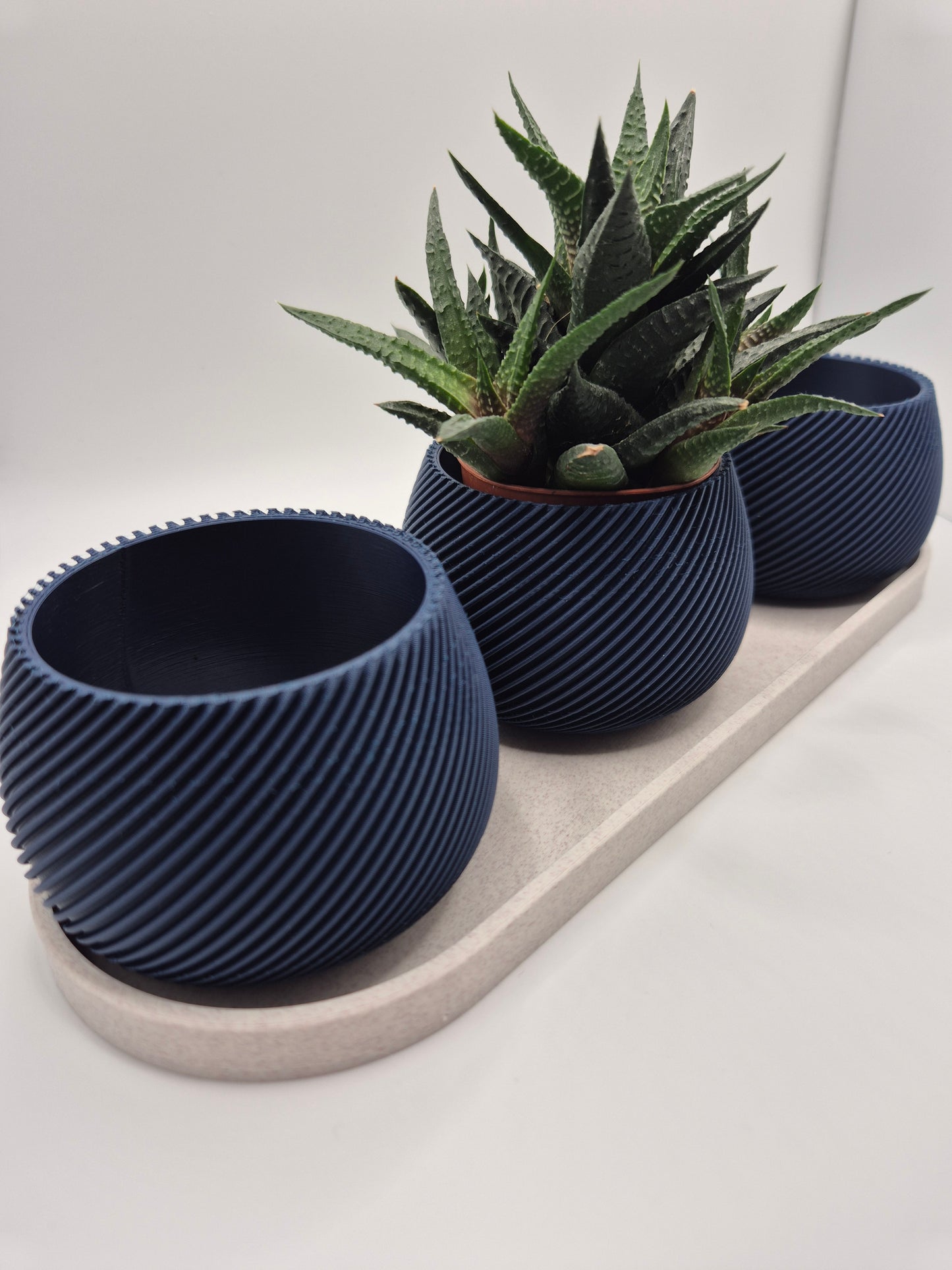 Elegant 3D printed plant pot and tea light holder set. White marble lattice design with plum insert. Perfect modern home decor gift. Made in UK.