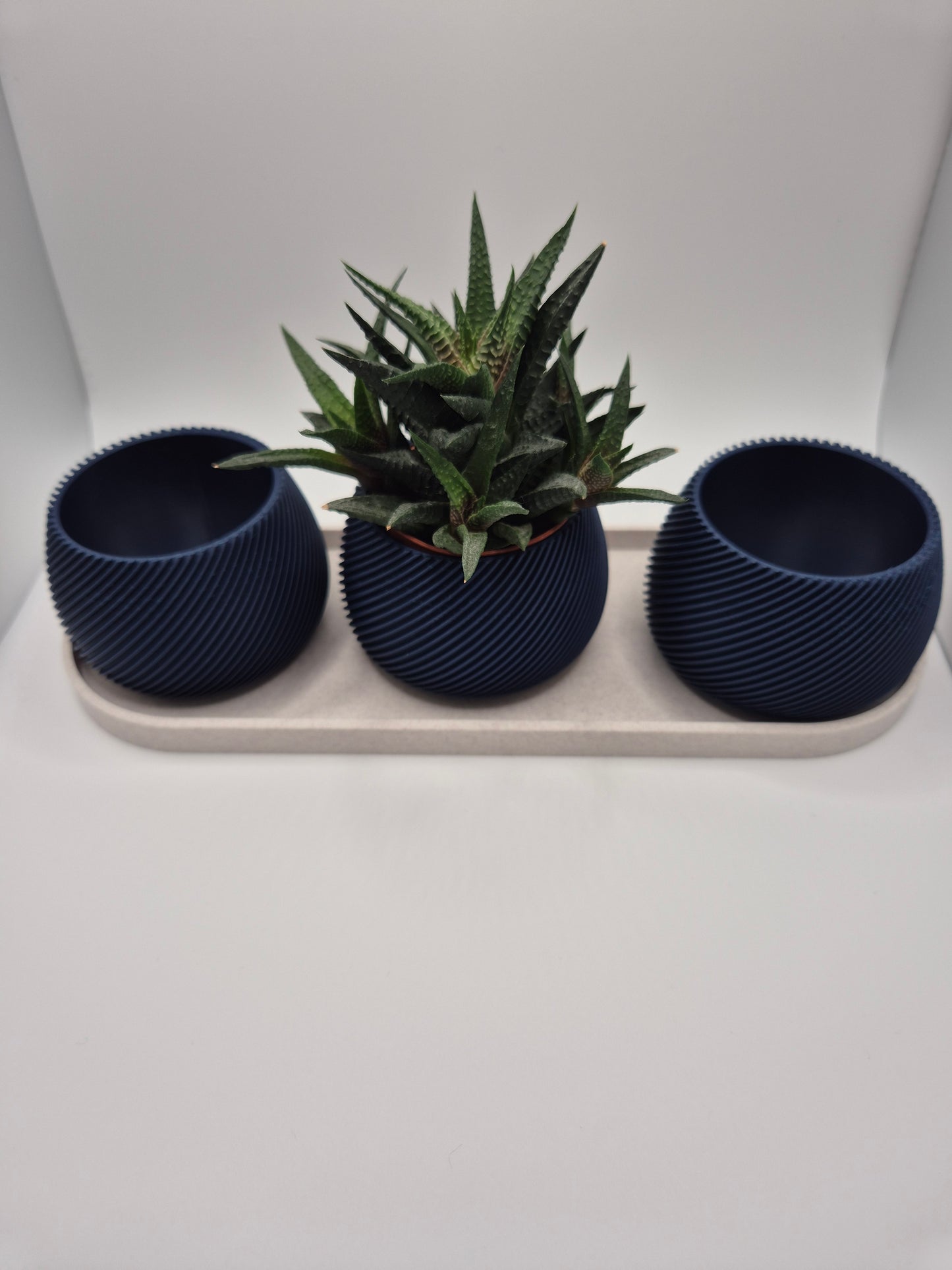 Elegant 3D printed plant pot and tea light holder set. White marble lattice design with plum insert. Perfect modern home decor gift. Made in UK.