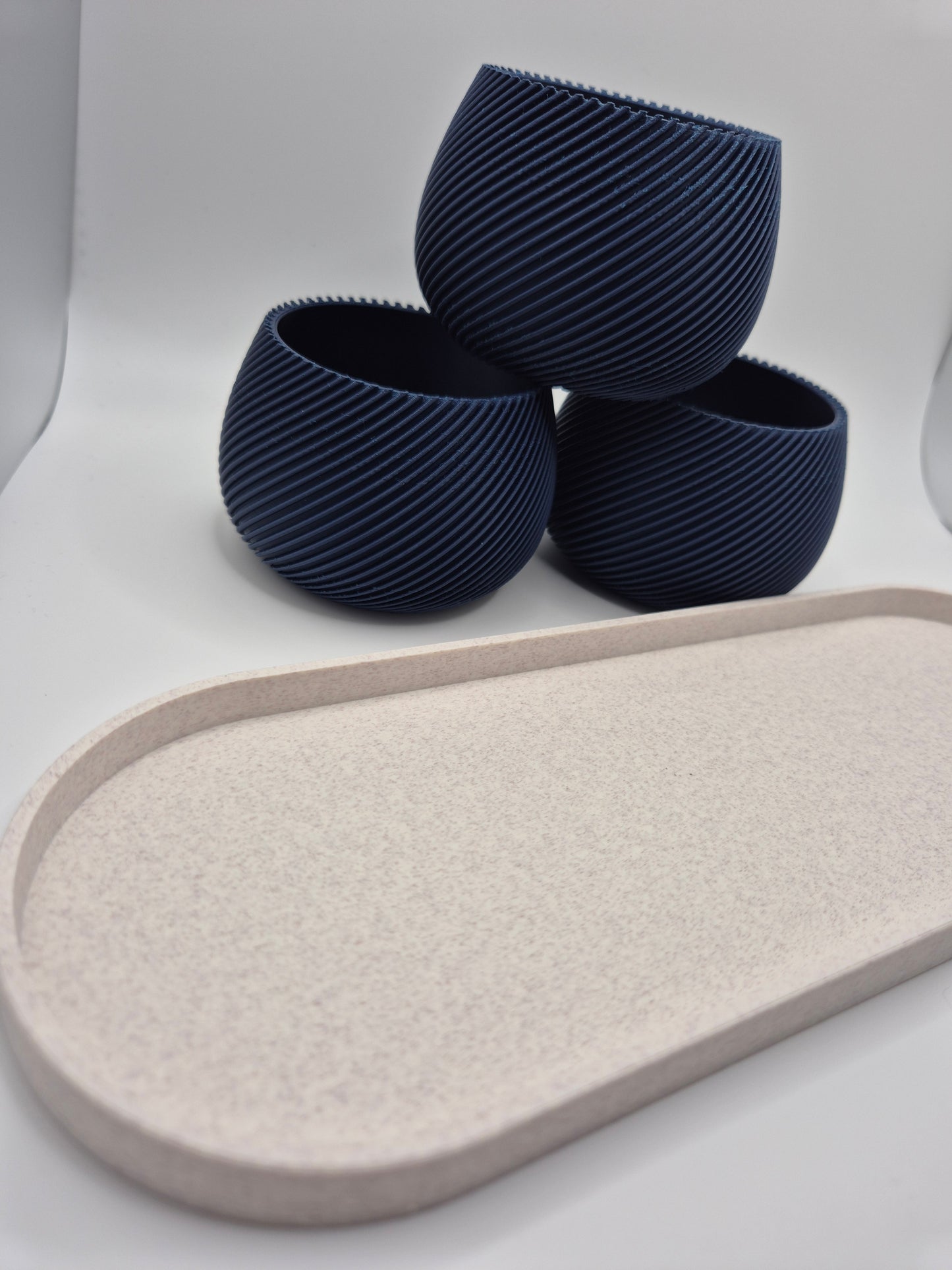 Elegant 3D printed plant pot and tea light holder set. White marble lattice design with plum insert. Perfect modern home decor gift. Made in UK.