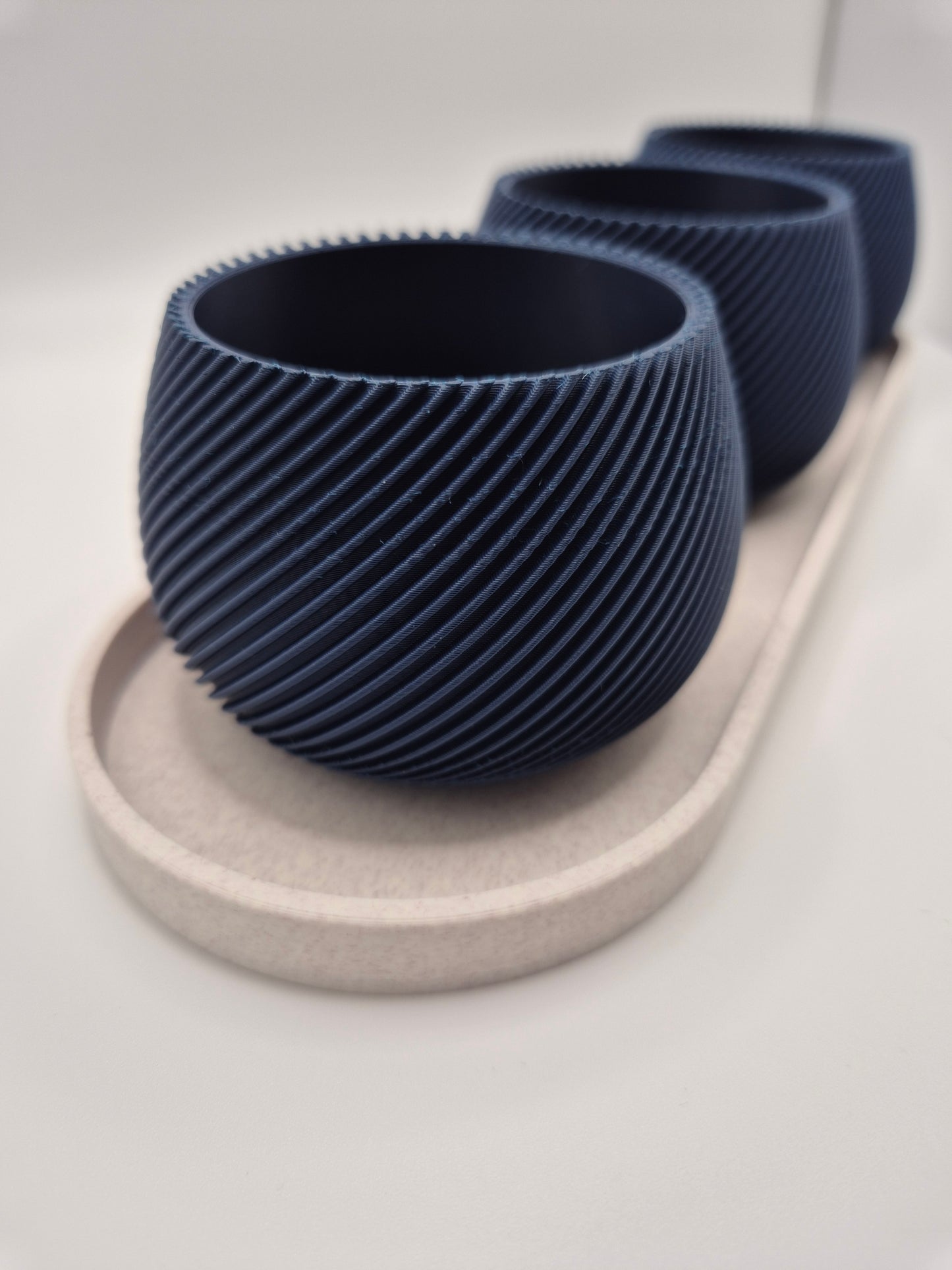 Elegant 3D printed plant pot and tea light holder set. White marble lattice design with plum insert. Perfect modern home decor gift. Made in UK.